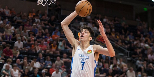 Chet Holmgren #7 of the Oklahoma City Thunder drives to the basket against the Memphis Grizzlies during the first half of their NBA Summer League game July 6, 2022 at the Vivint Smart Home Arena in Salt Lake City, Utah.