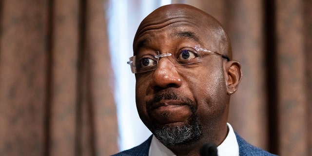 WASHINGTON, DC - MAY 10: Sen. Raphael Warnock, D-Ga., questions Treasury Secretary Janet Yellen during the Senate Banking, Housing, and Urban Affairs Committee hearing