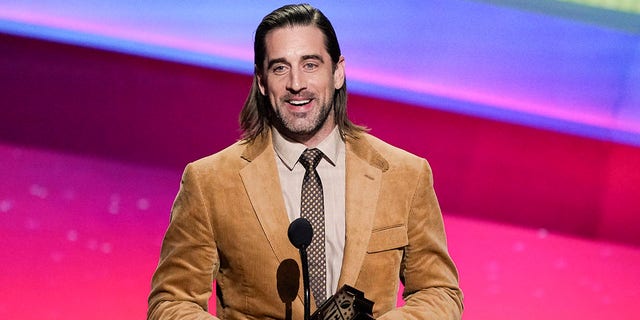 Aaron Rodgers of the Green Bay Packers receives the AP Most Valuable Player of the Year Award at the NFL Honors show on Feb. 10, 2022, in Inglewood, California.