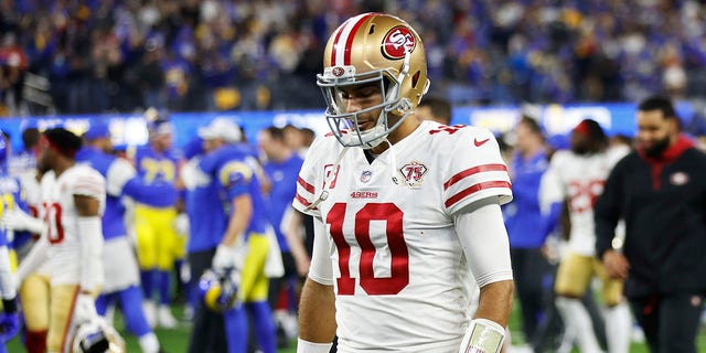 Jimmy Garoppolo of the San Francisco 49ers walks off the field after being defeated by the Los Angeles Rams in the NFC championship game at SoFi Stadium Jan. 30, 2022, in Inglewood, Calif. The Rams defeated the 49ers 20-17. 