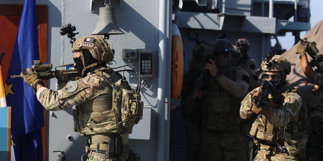 Members of the Special Operations Team of the Cypriot National Guard and U.S. Navy SEALs participate in a joint military training in Limassol, Cyprus, September 10, 2021. REUTERS/Yiannis Kourtoglou