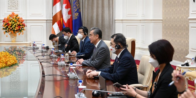 Chinese Foreign Minister Wang Yi speaks during a meeting with Cambodia's Prime Minister Hun Sen in Phnom Penh, Cambodia, August 3, 2022. 