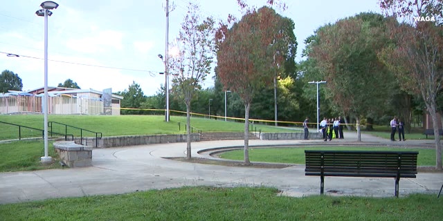 A baseball or softball game was being played at the park when the shooting took place.