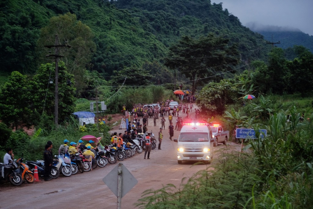 Police gathered outside the Tham Luang cave in 2018