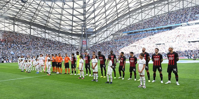 Two Teams Line-up during the Friendly match between Marseille and Milan AC at Orange Velodrome on July 31, 2022 in Marseille, France. 