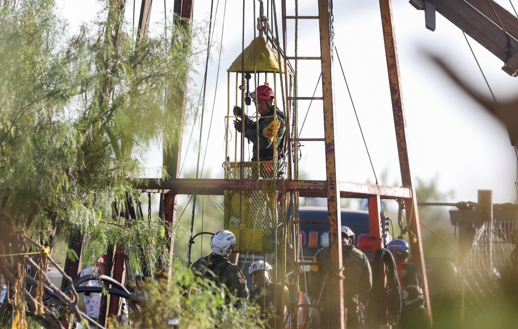 Rescue crews participate in the rescue operation for miners trapped in a coal mine that collapsed in Sabinas, Coahuila state, Mexico on August 11, 2022.