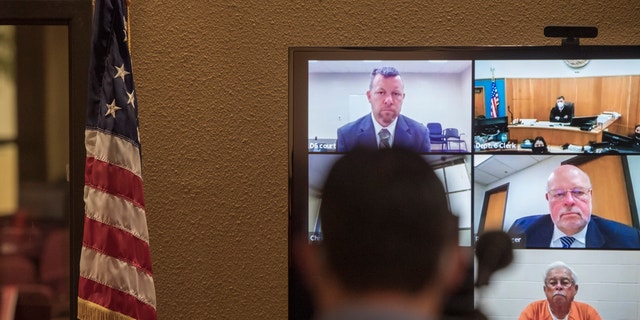 In this Thursday, April 15, 2021, file photo, defendants Paul Flores, top left, and his father, Ruben Flores, bottom right, appear via video conference during their arraignment in San Luis Obispo Superior Court in San Luis Obispo, Calif. 