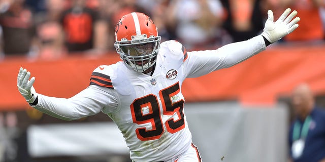Cleveland Browns defensive end Myles Garrett celebrates after sacking Chicago Bears quarterback Justin Fields during the second half of a game Sept. 26, 2021, in Cleveland.