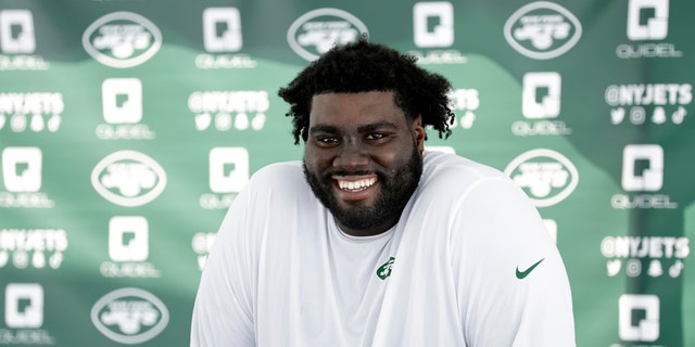 New York Jets tackle Mekhi Becton speaks to the media at the NFL football team's practice facility in Florham Park, N.J., on July 27, 2022. 