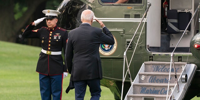 President Joe Biden salutes as he boards Marine One on the South Lawn of the White House in Washington, on his way to his Rehoboth Beach, Del., home after his most recent COVID-19 isolation, Sunday, Aug. 7, 2022.