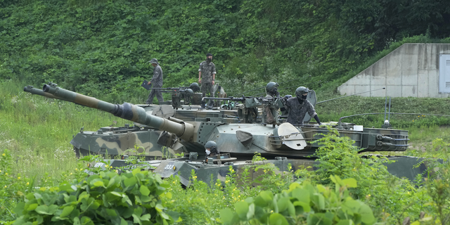 FILE - South Korean army soldiers prepare for an exercise at a training field in Paju, South Korea, near the border with North Korea, Wednesday, July 27, 2022. (AP Photo/Ahn Young-joon, File)