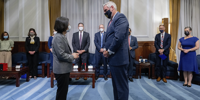 Indiana Governor Eric Holcomb speaks during a meeting with Taiwan's President Tsai Ing-wen. 