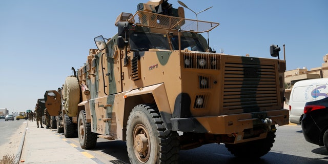 Libyan forces are deployed in Tripoli, Libya, Saturday, Aug. 27, 2022. Clashes broke out early Saturday between rival militias in Libya's capital, a health official said. 