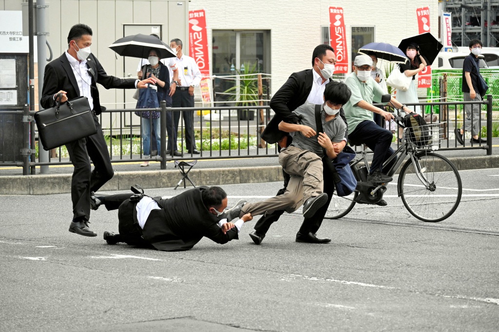 Shinzo Abe's murderer is tackled and detained in Nara, Japan after the attack on July 8, 2022.