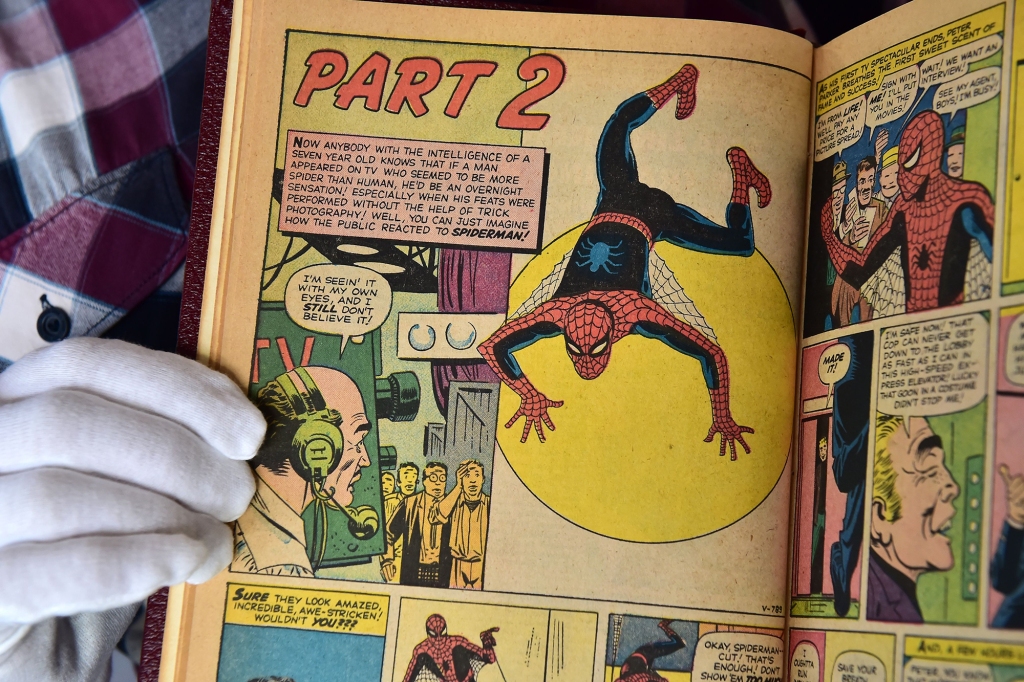 A custom bound one-of-a-kind hardcover book that includes the first 10 issues of The Amazing Spider-Man, "Strange Tales Annual #2", and "Amazing Fantasy #15" (1962-1964) comics, part of a selection of 20 works associated with the late Stan Lee's comics universe, is displayed at Julien's Auctions in Beverly Hills, California, on November 13, 2018. 