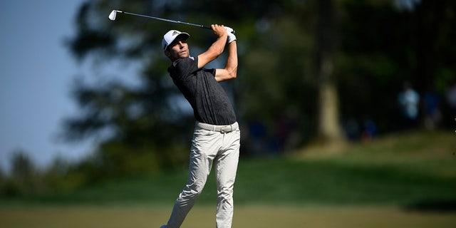 Joaquin Niemann, of Chile, hits on the 12th hole during the third round of the BMW Championship golf tournament at Wilmington Country Club, Saturday, Aug. 20, 2022, in Wilmington, Del.