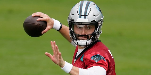 Carolina panthers' Baker Mayfield passes during the NFL football team's training camp in Gibbs Stadium at Wofford College on Saturday, July 30, 2022, in Spartanburg, S.C.