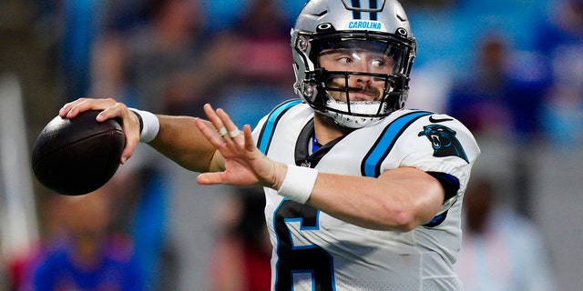 Carolina Panthers quarterback Baker Mayfield passes against the Buffalo Bills during the first have of an NFL preseason football game on Friday, Aug. 26, 2022, in Charlotte, N.C.