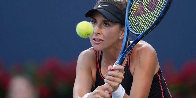 Belinda Bencic hits a return to Serena Williams during the National Bank Open tennis tournament on Aug. 10, 2022, in Toronto.