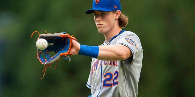 The New York Mets' Brett Baty warms up before the team's game against the Atlanta Braves Wednesday, Aug. 17, 2022, in Atlanta.