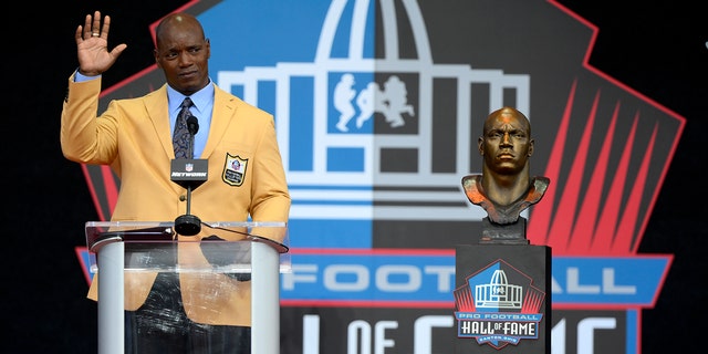 Former NFL player Bryant Young speaks during his induction into the Pro Football Hall of Fame, Saturday, Aug. 6, 2022, in Canton, Ohio.