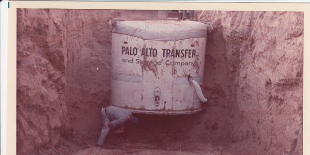 Officials begin to dig out the truck trailer in the Livermore, Calif. rock quarry, in which 26 Chowchilla schoolchildren and their bus driver, Ed Ray were held captive. 