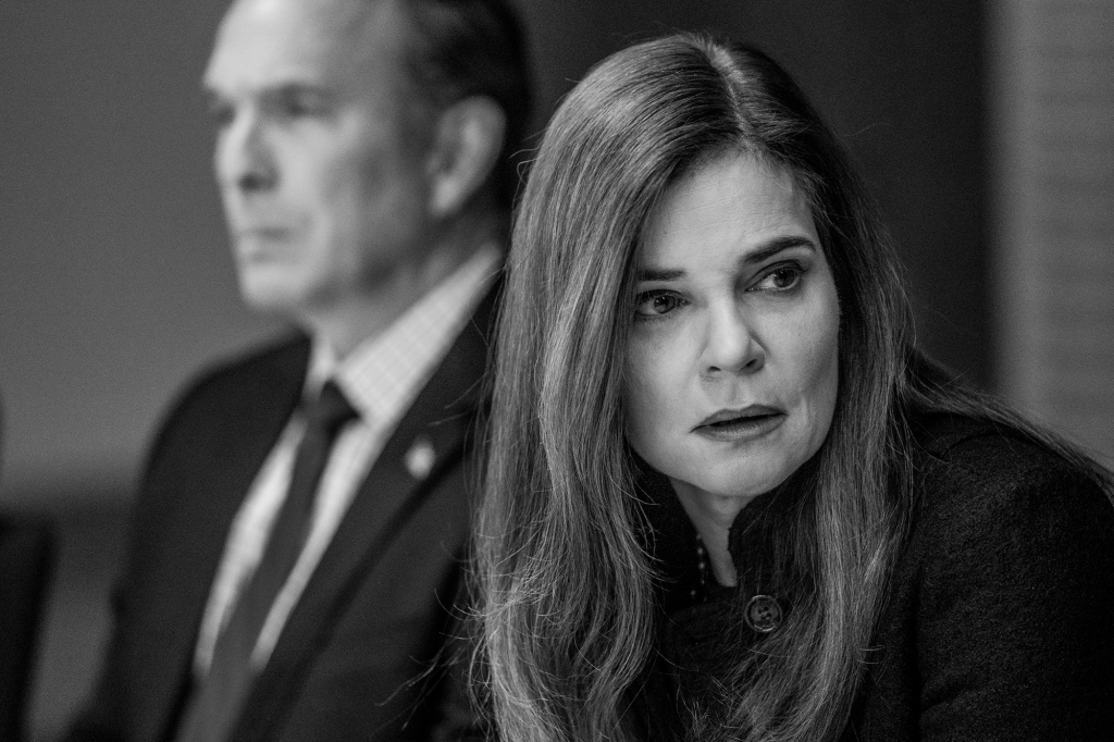 Photo of Betsy Brandt as Marie Schrader from "Breaking Bad" in the series finale of "Better Call Saul." She's sitting in the courtroom and is looking off-camera with a trouble look on her face.