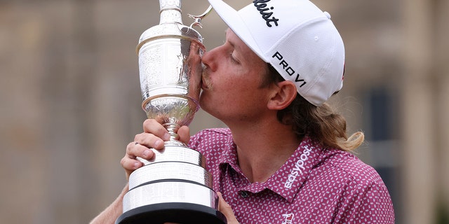 Cameron Smith of Australia kisses the claret jug trophy after winning the British Open at the Old Course at St. Andrews, Scotland, on July 17, 2022.