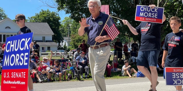 State Senate President Chuck Morse, who's running for the GOP U.S. Senate nomination, marches in the Fourth of July parade in Amherst, New Hampshire.