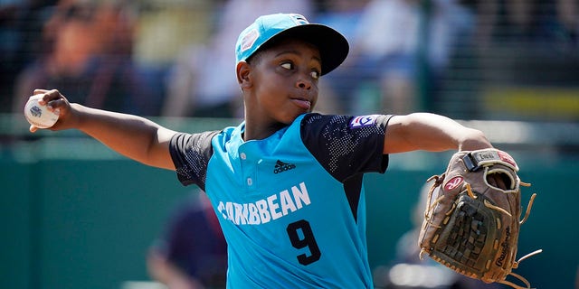 Curacao's Shemar Jacobus delivers in the first inning of the Little League World Series championship game against Honolulu  in South Williamsport, Pennsylvania, on Aug. 28, 2022.