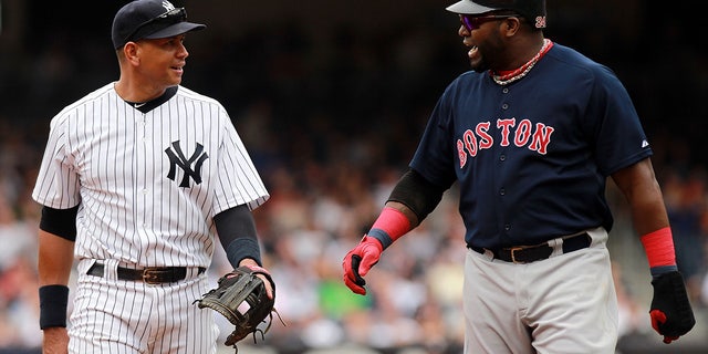 Alex Rodriguez of the New York Yankees talks to David Ortiz of the Boston Red Sox on Sept. 25, 2011, at Yankee Stadium in the Bronx.