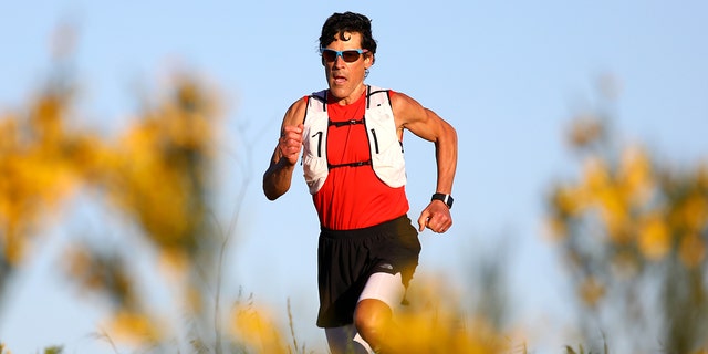 Ultramarathon runner Dean Karnazes does a training run on Bald Hill on April 24, 2020, in Ross, California.
