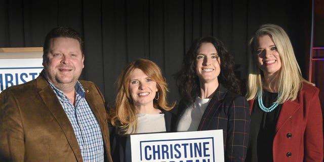 Oregon GOP gubernatorial candidate Christine Drazan poses with supporters.