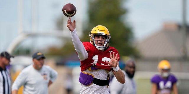 LSU quarterback Garrett Nussmeier (13) throws a pass during NCAA college football practice in Baton Rouge, La., Wednesday, Aug. 17, 2022.