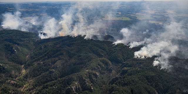 View of the fire in Germany from a helicopter. (Robert Michael/dpa via AP)