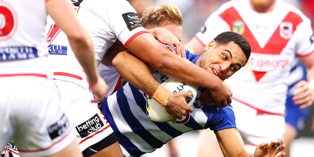 Michael Lichaa of the Bulldogs is tackled during a round 24 NRL match between the St. George Illawarra Dragons and the Canterbury Bulldogs at UOW Jubilee Oval Aug. 26, 2018, in Sydney, Australia. 