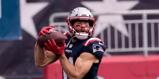 New England Patriots wide receiver Julian Edelman makes a catch before a game against the Las Vegas Raiders on Sept. 27, 2020, at Gillette Stadium in Foxborough, Massachusetts.