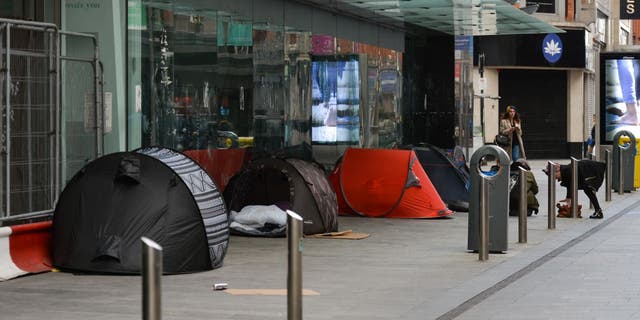 A view of a rough sleeper's tents outside a closed shop on Henry Street in Dublin city center during the final days of the level five COVID-19 lockdown. 