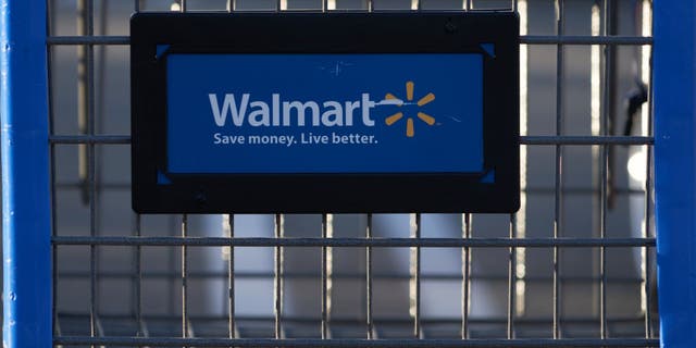 A shopping cart outside a Walmart store in Torrance, Calif. May 15, 2022. 