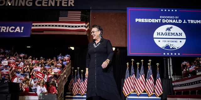 Republican Wyoming congressional candidate Harriet Hageman with former President Donald Trump at a rally on May 28, 2022 in Casper, Wyoming.  