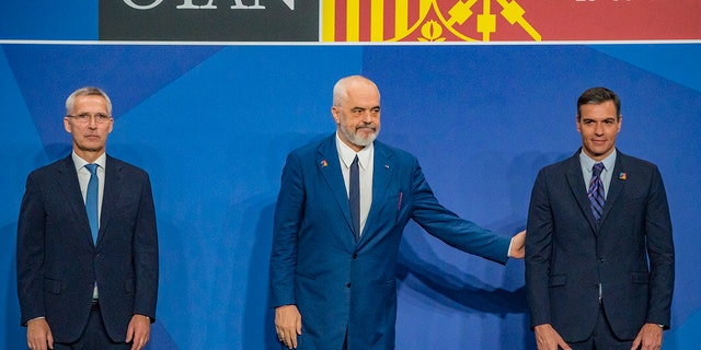 Secretary General of NATO, Jens Stoltenberg, left, the Prime Minister of Albania, Edi Rama, center, and the President of Spain, Pedro Sanchez, right, in the opening ceremony of the NATO Summit in Madrid, Spain. 