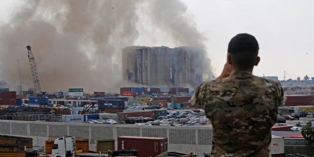 Dust rises after part of the Beirut port grain silos collapsed in Beirut, Lebanon, on Aug. 4, 2022.