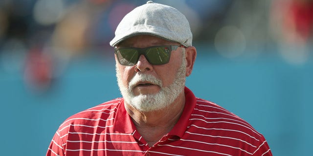 Tampa Bay Buccaneers senior adviser Bruce Arians walks onto the field before the preseason game against the Tennessee Titans at Nissan Stadium in Nashville, Tennessee, on Aug. 20, 2022.