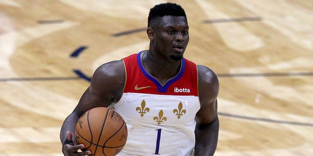 Zion Williamson of the New Orleans Pelicans dribbles the ball during the fourth quarter of a game against the Golden State Warriors at Smoothie King Center on May 4, 2021, in New Orleans.