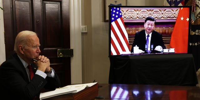 President Biden participates in a virtual meeting with Chinese President Xi Jinping at the Roosevelt Room of the White House Nov. 15, 2021, in Washington, D.C.