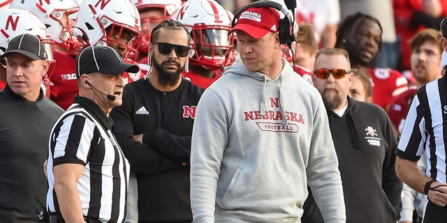 Head coach Scott Frost of the Nebraska Cornhuskers discusses a call with an official against the Iowa Hawkeyes in the second half at Memorial Stadium on November 26, 2021 in Lincoln, Nebraska. 