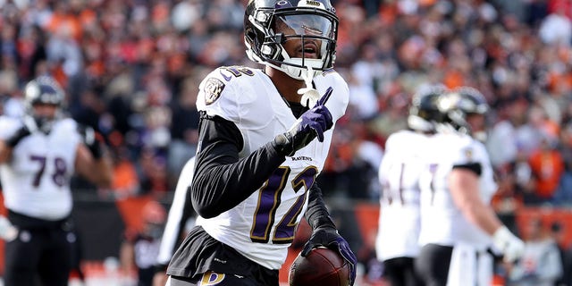 Rashod Bateman #12 of the Baltimore Ravens celebrates a touchdown during the first quarter in the game against the Cincinnati Bengals at Paul Brown Stadium on December 26, 2021 in Cincinnati, Ohio. 