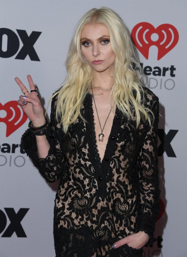 Taylor Momsen poses in the iHeartRadio Music Awards - Press Room at Shrine Auditorium and Expo Hall on March 22, 2022.