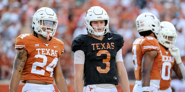 Quinn Ewers, #3 of Texas Longhorns, looks to the sideline for a play during the Orange-White Spring Game at Darrell K Royal-Texas Memorial Stadium on April 23, 2022 in Austin, Texas. 