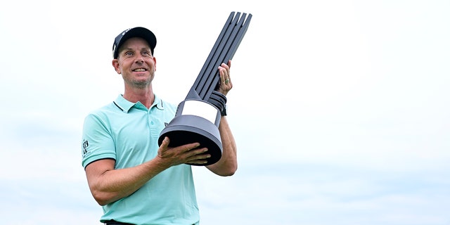 Henrik Stenson of Majesticks GC poses with the first-place individual trophy after winning during day three of the LIV Golf Invitational - Bedminster at Trump National Golf Club Bedminster, July 31, 2022, in Bedminster, New Jersey.